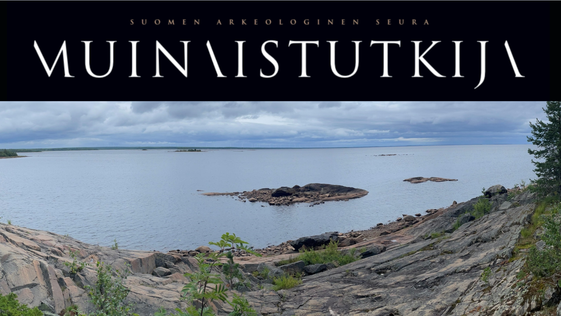 Kallion ylikuvattu merimaisema, keskellä pieni saari.
